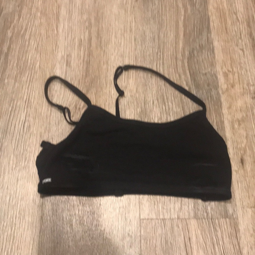 Pink VS black sports bra